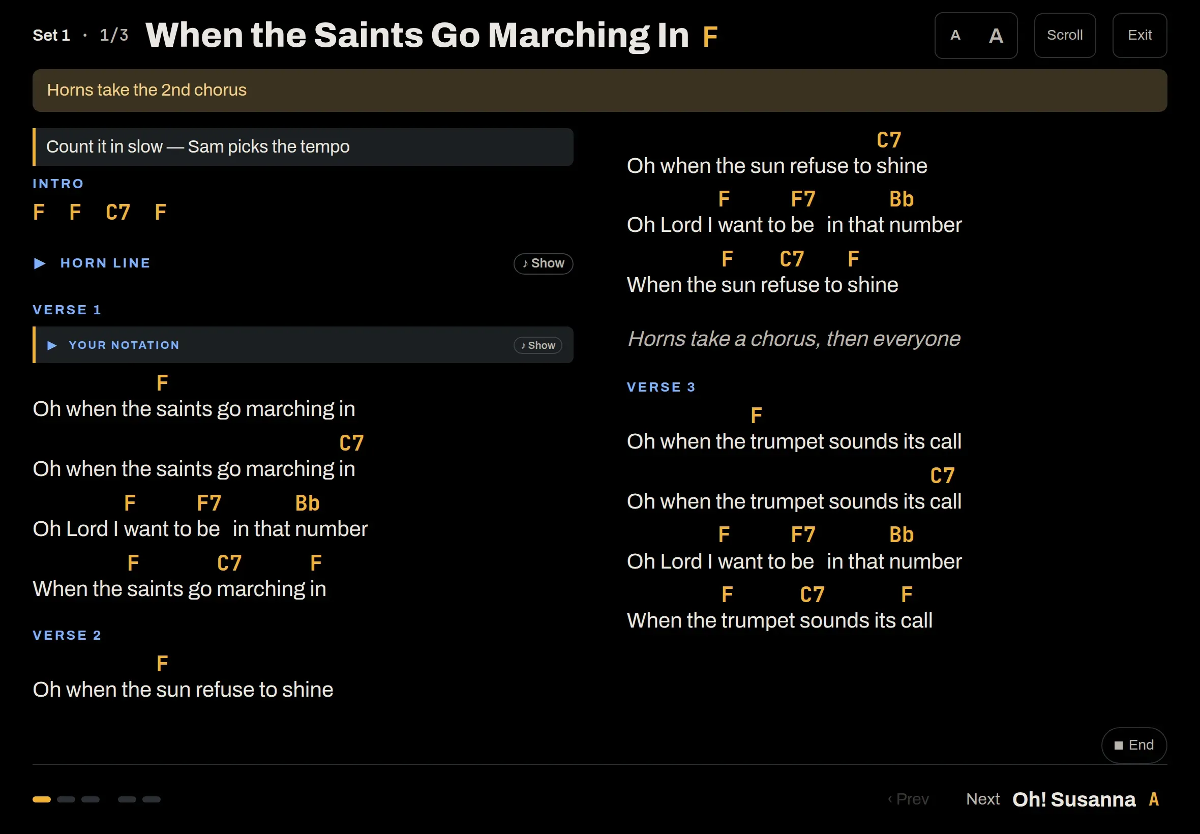 Bandstand's performance mode on an iPad: a chord chart for When the Saints Go Marching In, in two columns, with a cue for the horns and the next song waiting at the bottom